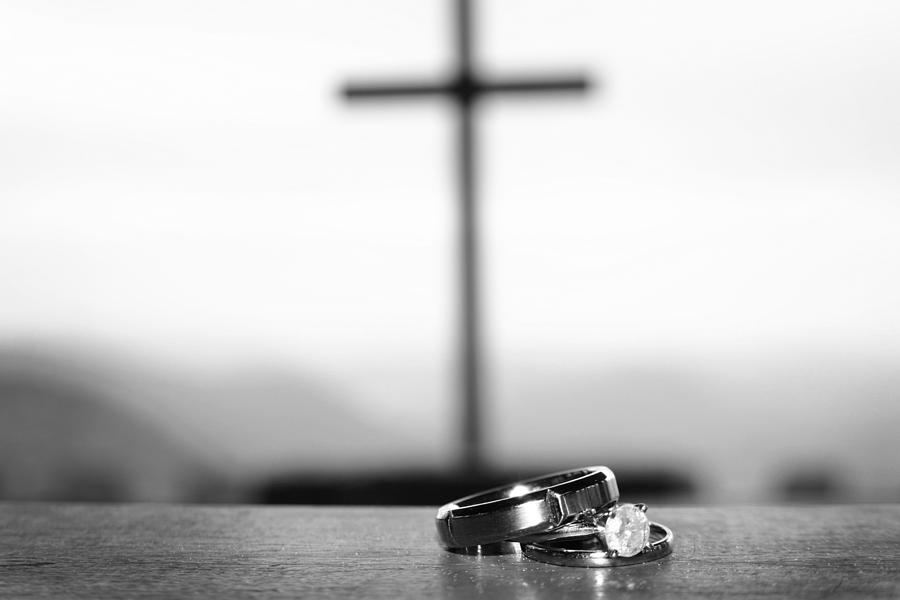 Rings and Cross Photograph by Kelly Hazel