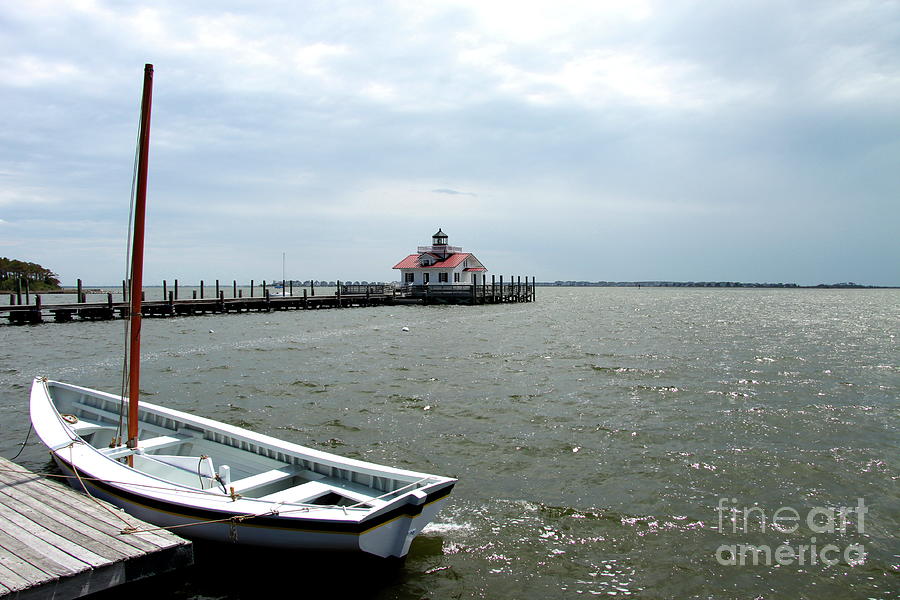 Nature Photograph - Roanoke Marshes Light And Boat by Christiane Schulze Art And Photography