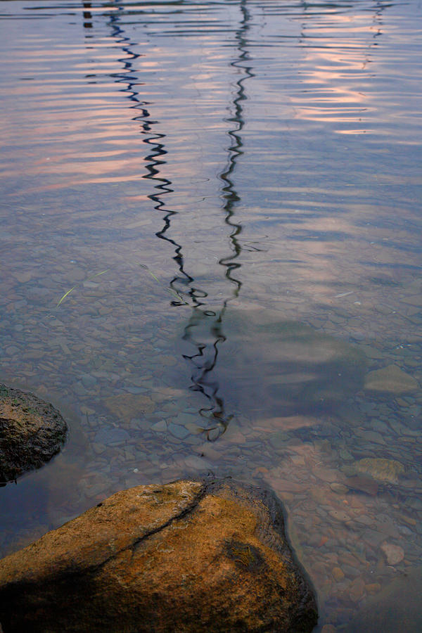 Rocks And Reflection Photograph by Steven Ainsworth