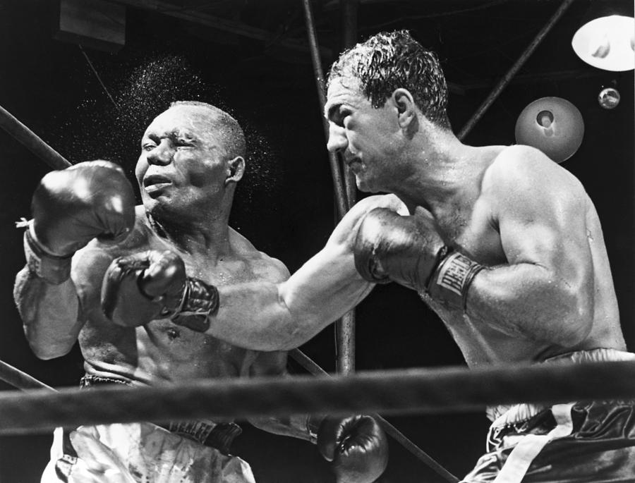 Rocky Marciano Landing A Punch by Everett