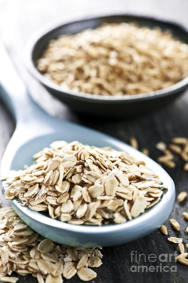 Rolled oats and oat groats Photograph by Elena Elisseeva