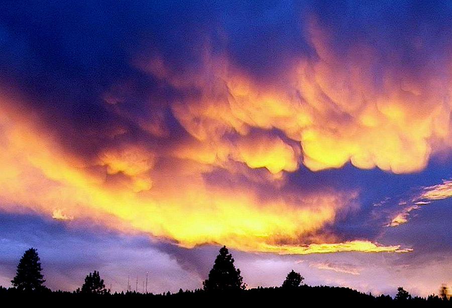 Rolling Clouds Sunset Photograph by Lori Seaman