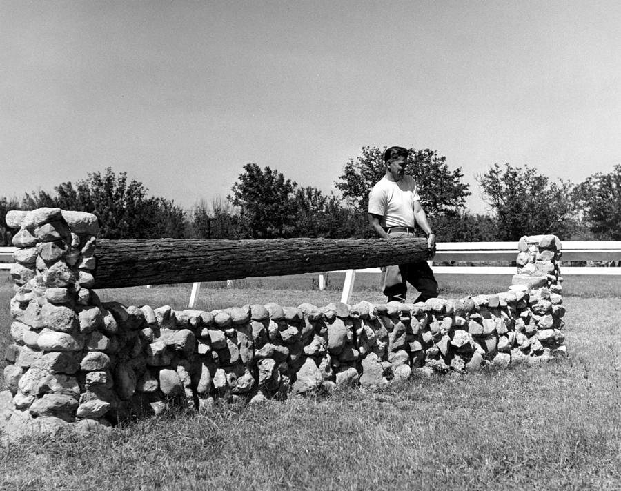 Ronald Reagan Repairs Horse Jump by Everett