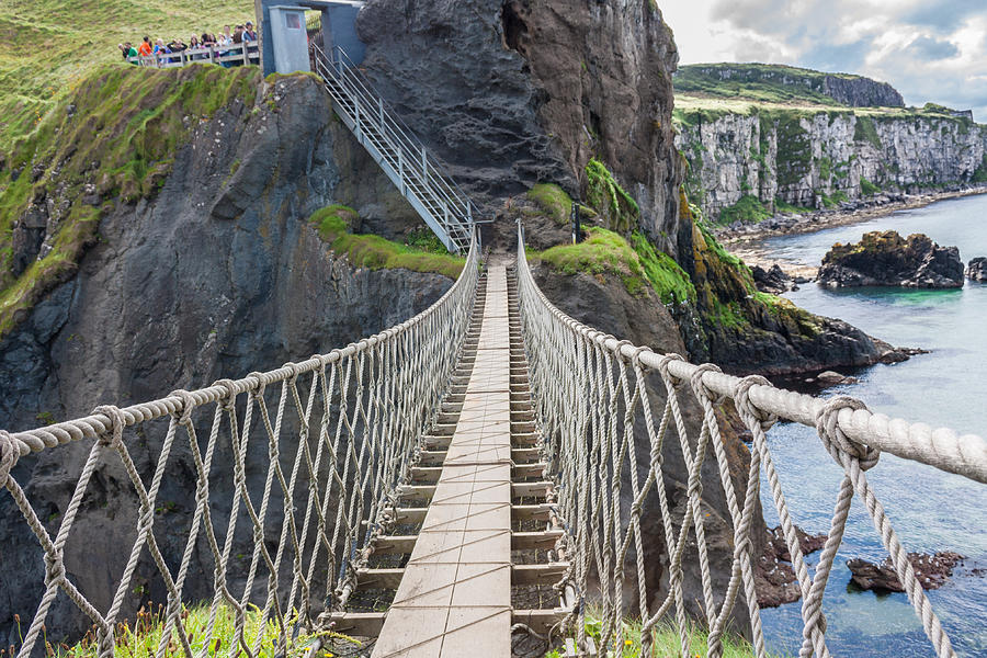 Rope Bridge at Carrick-a-Rede in Northern Island Photograph by Semmick Photo