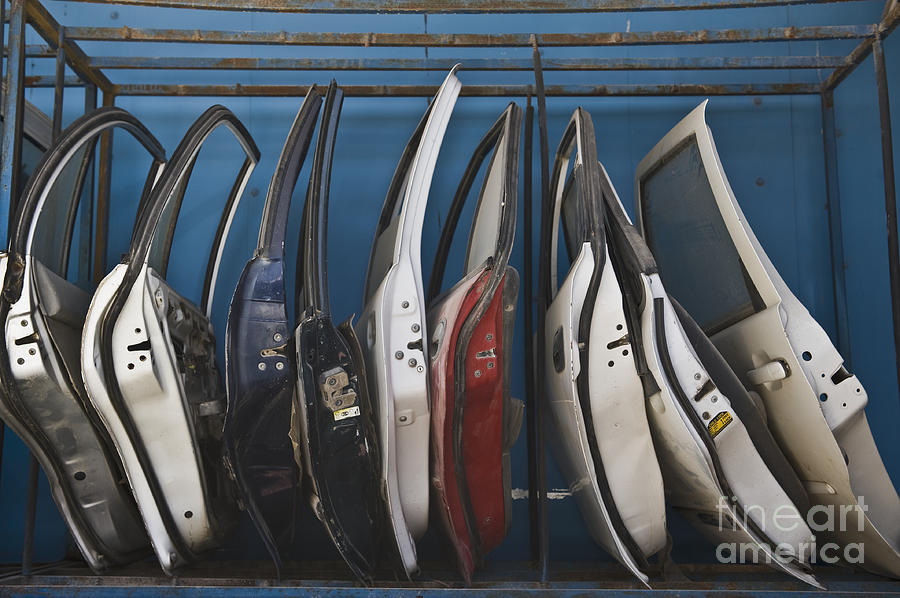 Row of Dismantled Car Doors Photograph by Noam Armonn - Fine Art America