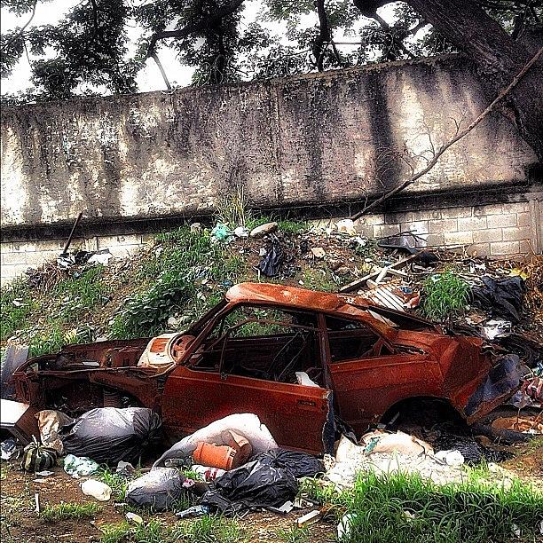 Ig Photograph - Rusted Car Abandoned On Garbage by OpɹᏌnpǝ 