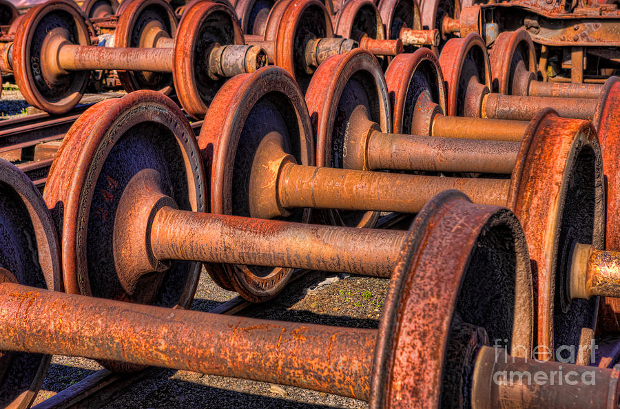 Rusty Railroad Car Wheelsets Photograph by Clarence Holmes