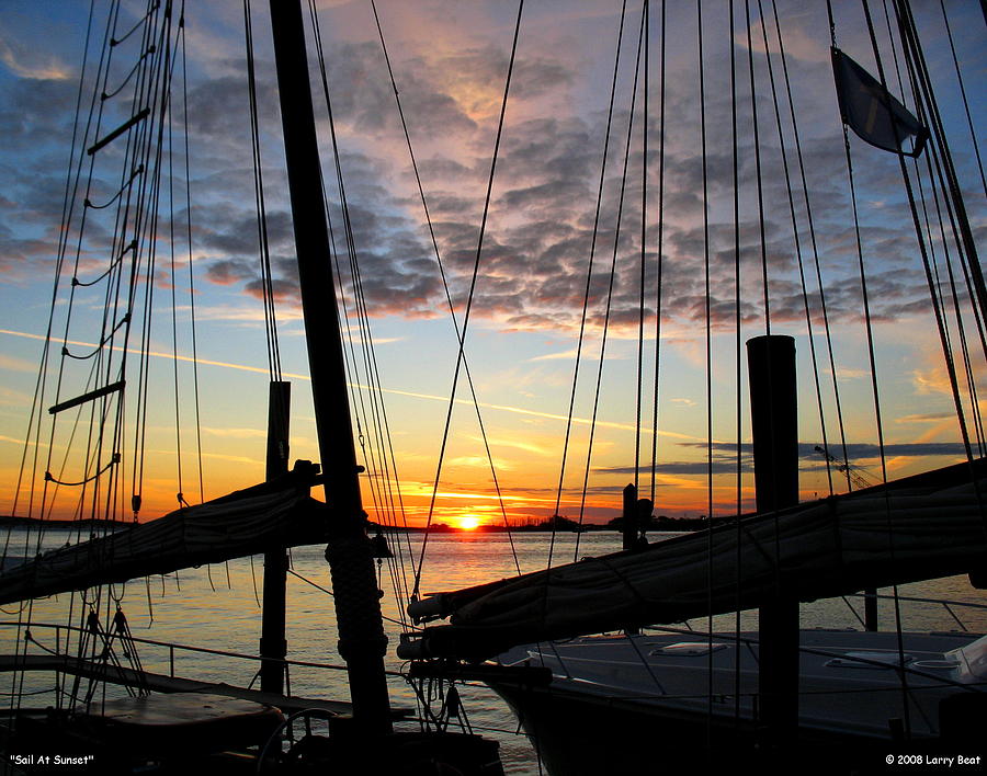 Sail At Sunset Photograph by Larry Beat