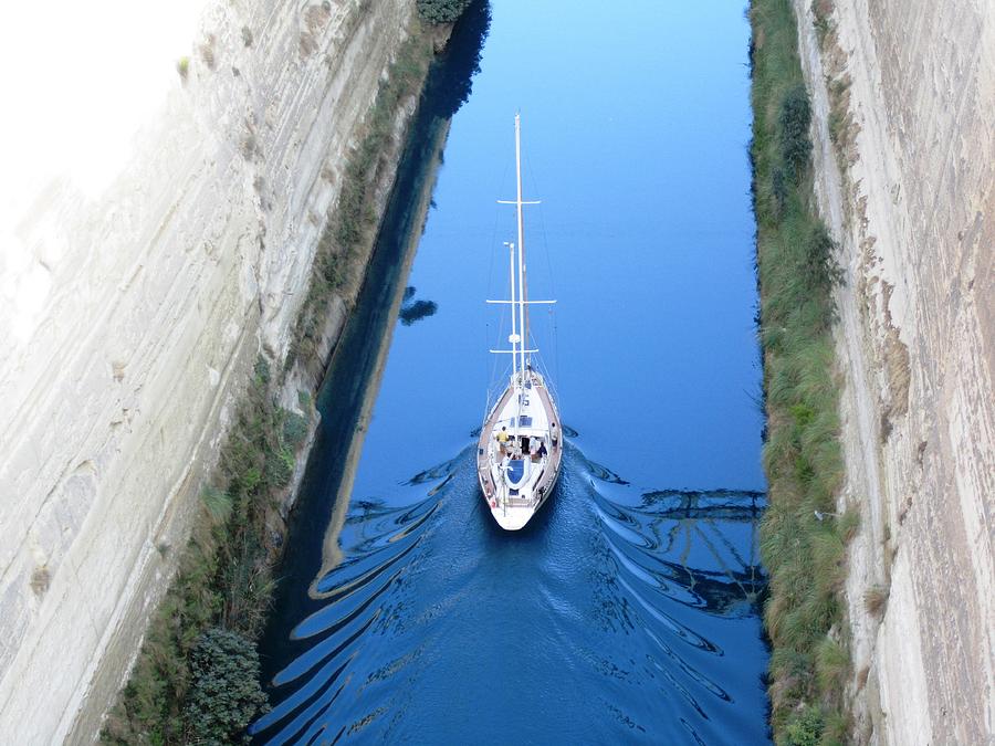 Sailboat sailing thru Corinth Canal Waters in Greece Photograph by John Shiron