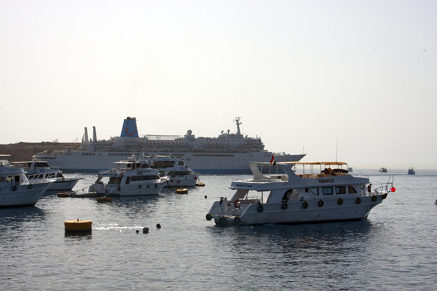 Sailing boats and a large yacht in the harbour at Sharm El Sheikh Photograph by Ashish Agarwal