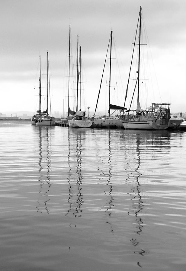 Sailing boats reflections Photograph by Gladys Yanes Pixels