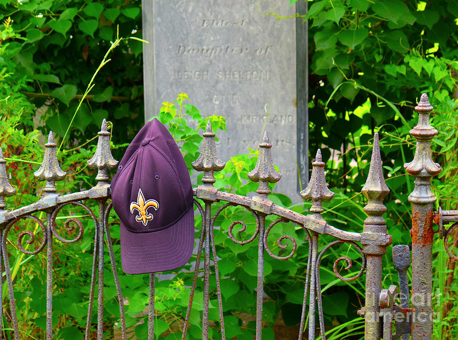 Saints Hat on Iron Fence Photograph by Jeanne  Woods