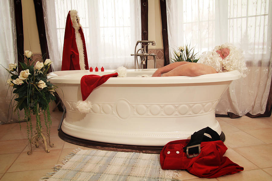 Santa Claus Relaxing In A Bath Photograph by Isabel Poulin