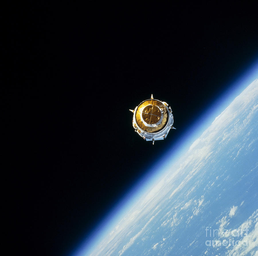 Space Photograph - Satellite In Outer Space by Stocktrek Images