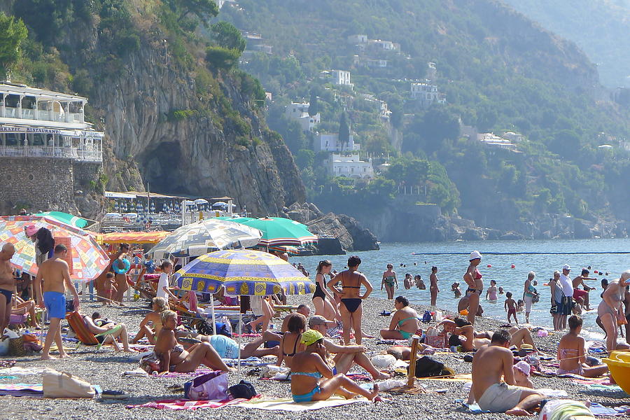 Scene at the beach in Positano Photograph by Nora Boghossian