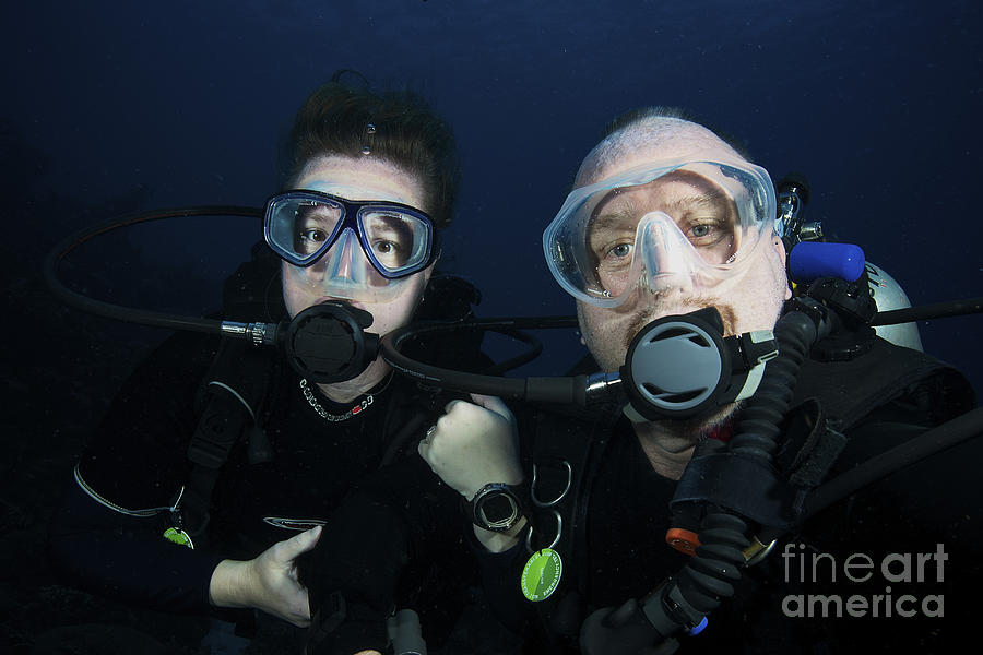 Nature Photograph - Scuba Divers Pose For The Camera by Terry Moore