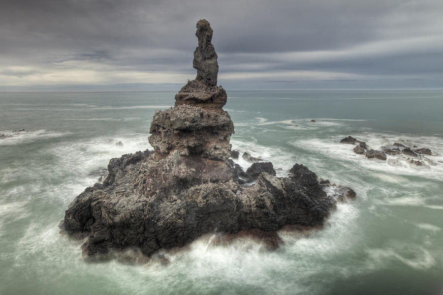 Sea Stack Off Tumbledown Bay Canterbury Photograph by Colin Monteath