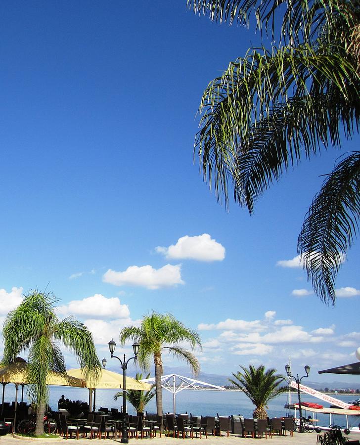Seaside Bay Cafe Blue Sky and Sun Umbrellas in Nafplion Greece Photograph by John Shiron