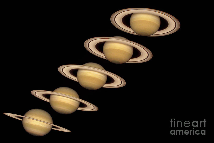 Seasons On Saturn Photograph by Nasa