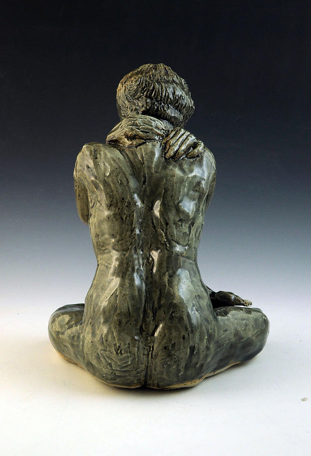 the seated figure