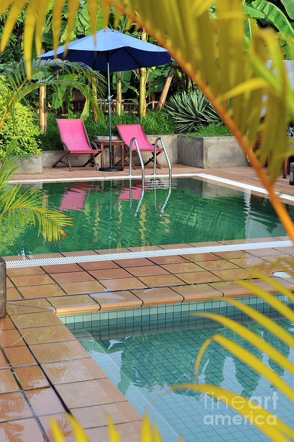 Seats And Umbrella By Swimming Pool Photograph By Sami Sarkis Pixels