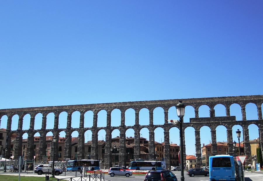 Segovia Ancient Roman Aqueduct A Water Conveyance Granite Stone Structure With Arches in Spain Photograph by John Shiron