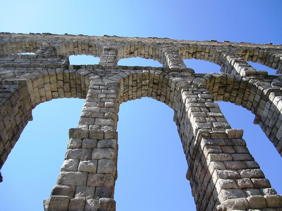 Segovia Ancient Roman Aqueduct Architectural Granite Stone Structure III With Arches in Sky Spain Photograph by John Shiron