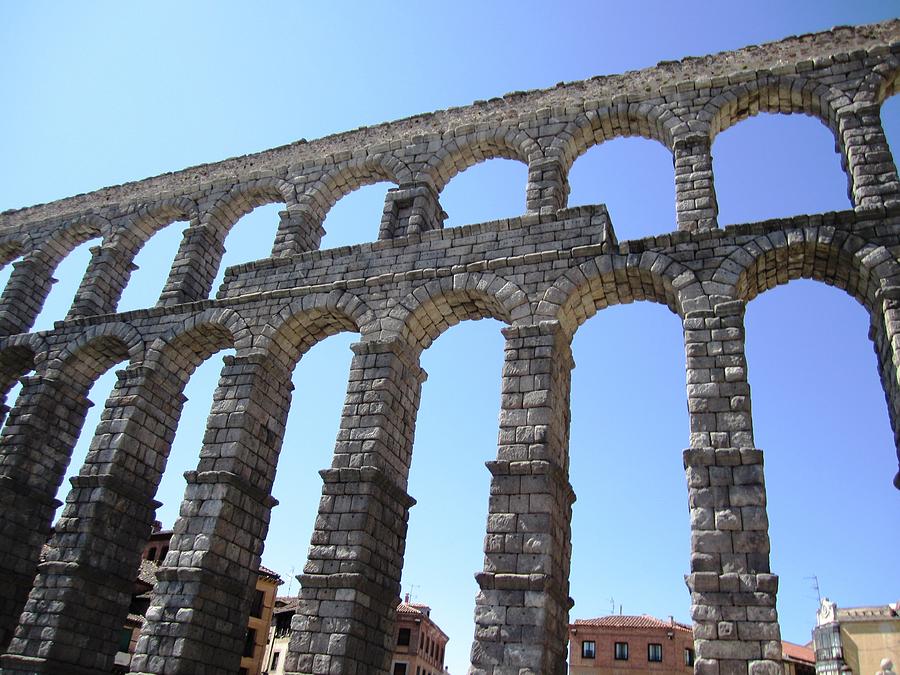 Segovia Ancient Roman Aqueduct Architectural Granite Stone Structure With Arches in Spain Photograph by John Shiron