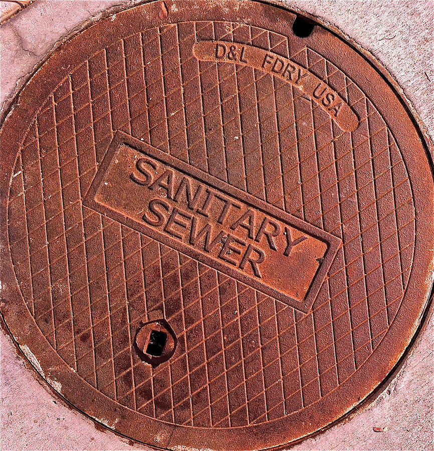 Sewer Cover Photograph by Bill Owen