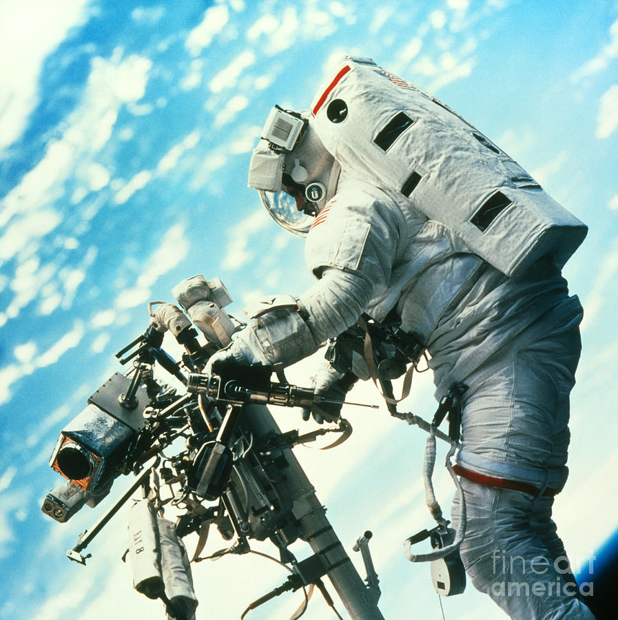 Shuttle Astronaut On Remote Manipulator Photograph by Nasa