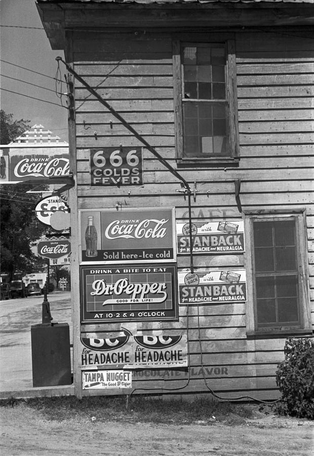 Side Of A Store, Showing Advertising Photograph by Everett - Fine Art ...