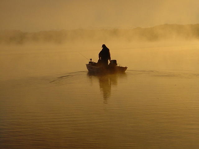 Silhouette of a Fisherman Photograph by Artie Wallace - Fine Art America