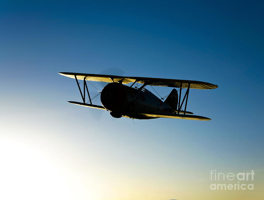 Silhouette Of A Grumman F3f Biplane Photograph by Scott Germain