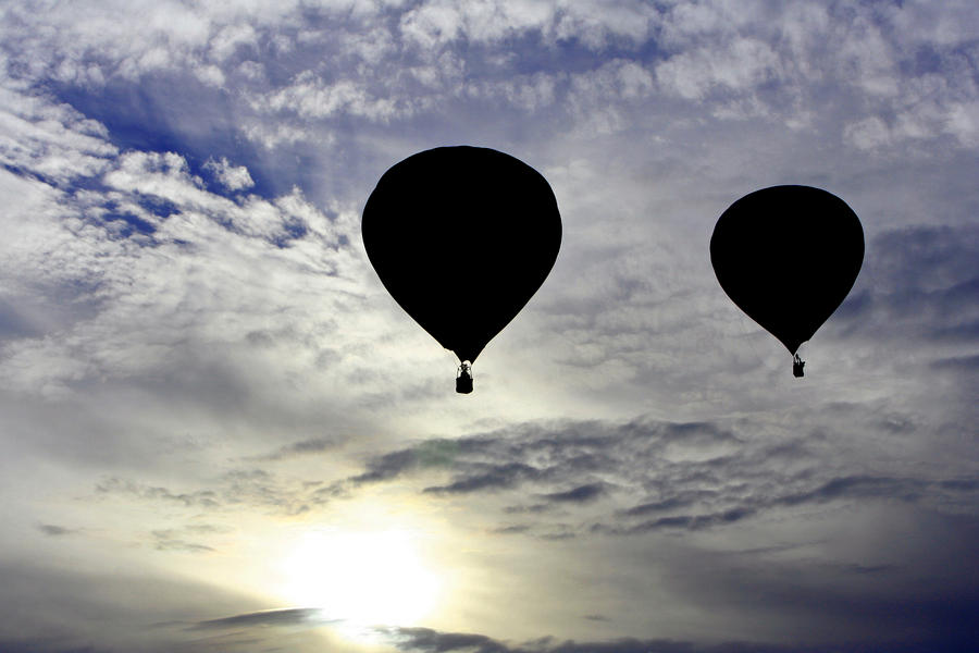 Silhouetted Hot Air Balloons Photograph by Joe Myeress