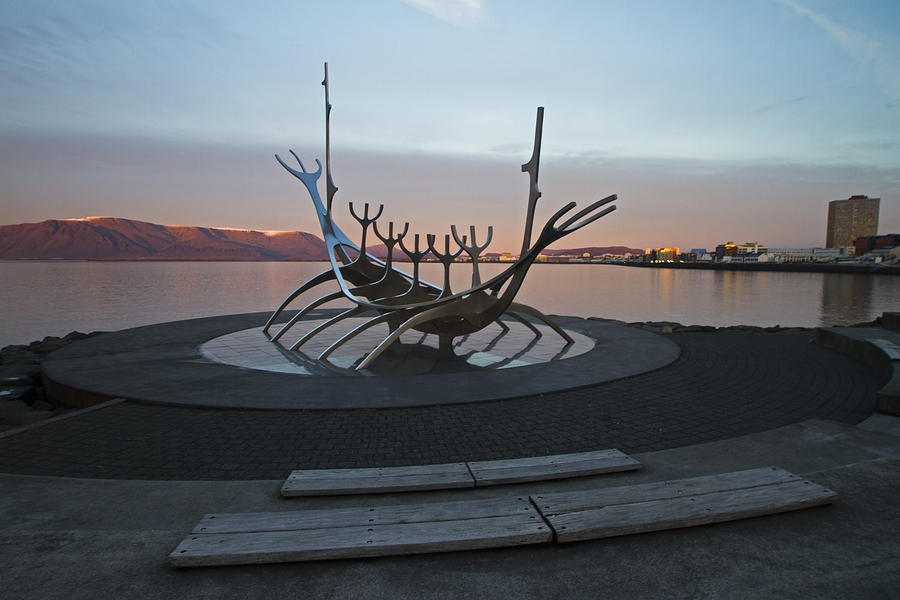 Silver ship sculpture at dusk Photograph by Sven Brogren