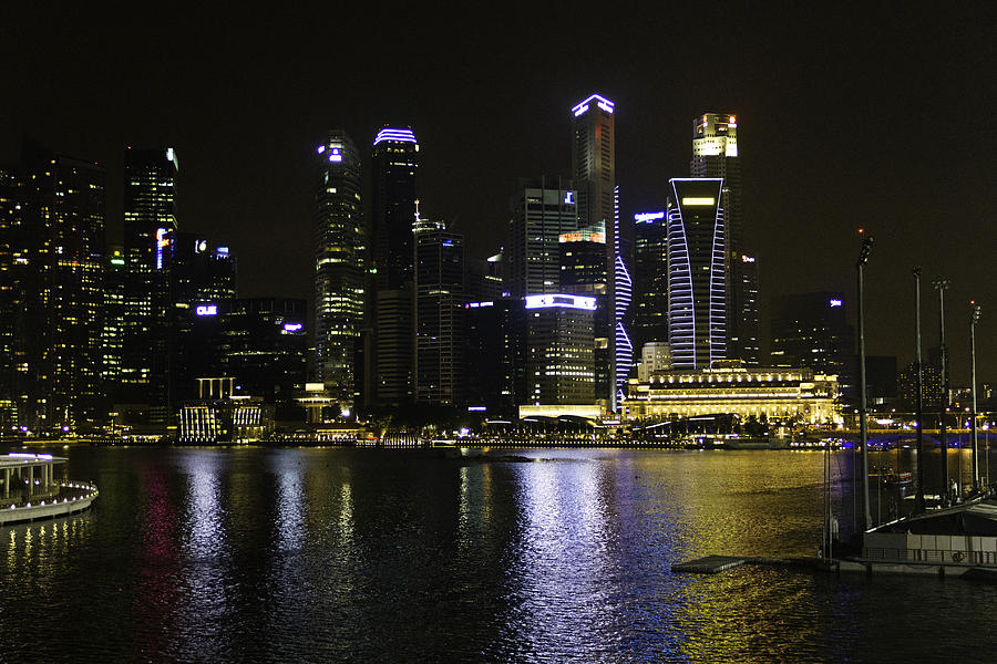 Singapore skyline as seen from the pedestrian bridge near the Ma Photograph by Ashish Agarwal
