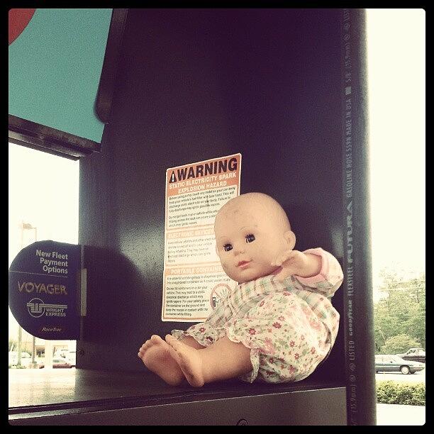 Creepy Photograph - Sitting On Top Of The Gas Pump I Pulled by Kensta Lopez