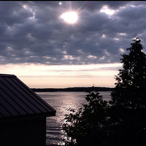Sunset Photograph - Skies Open At The St. Lawrence River by Cheryl Matochik