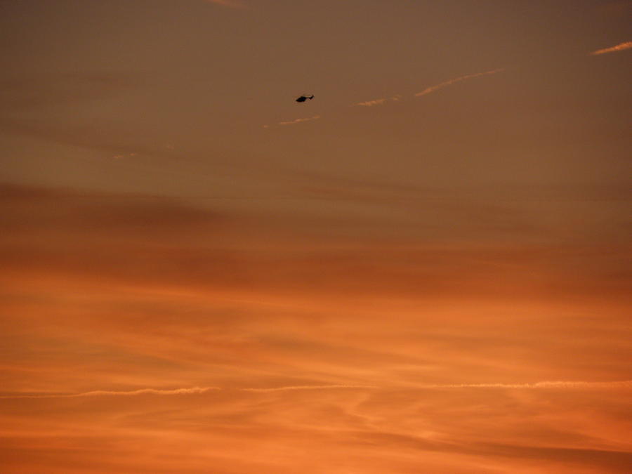 Sky Sunset With A Helicopter In The Distance Photograph by Kim Galluzzo Wozniak