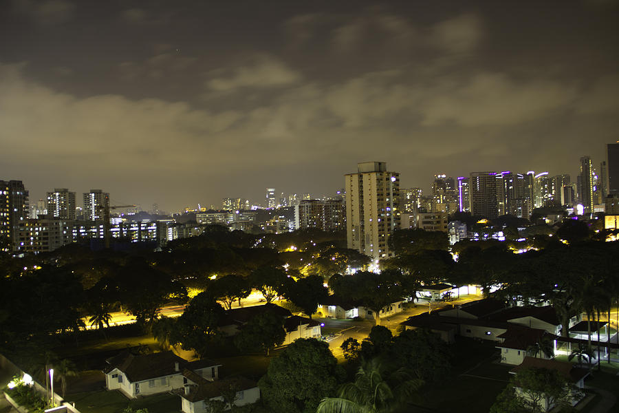 Skyline of a part of Singapore at night Photograph by Ashish Agarwal