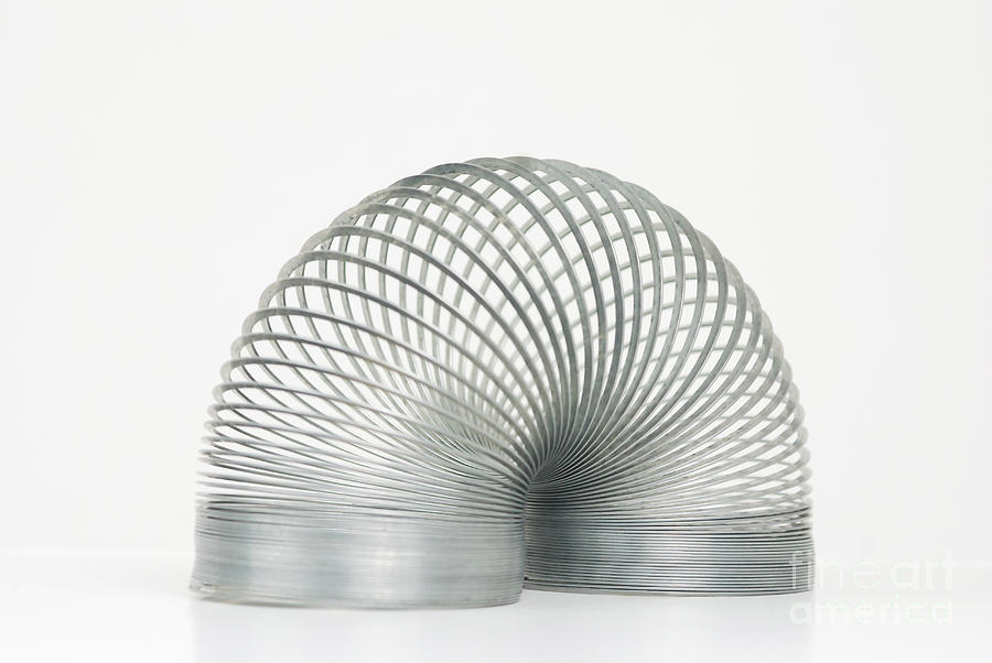 Slinky Toy Photograph by Photo Researchers, Inc.