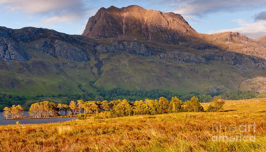 Slioch across the waters of Loch Maree Photograph by Maciej Markiewicz