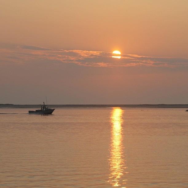 Sunset Photograph - Small Boat At Sunrise  by Justin Connor
