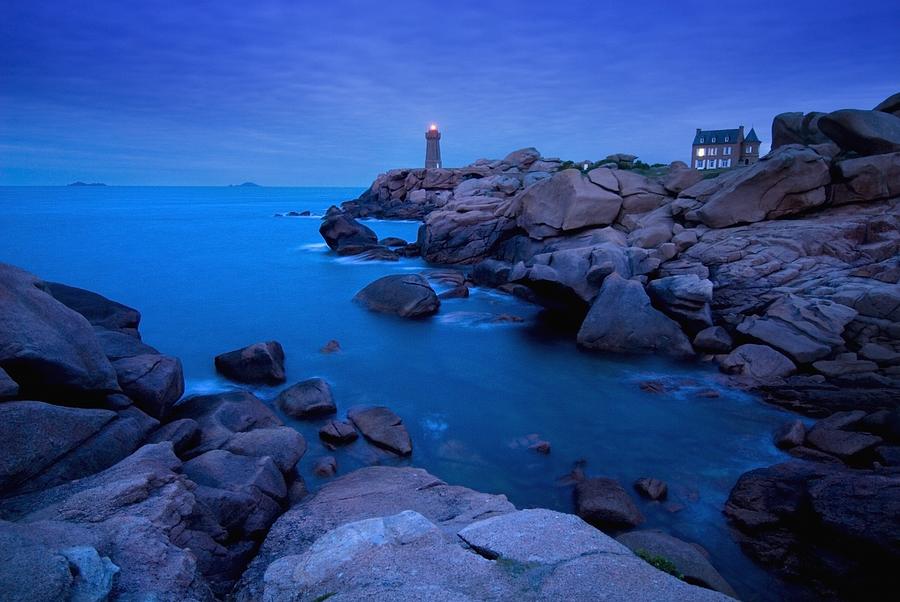 Lighthouse Photograph - Small Lighthouse And House At Dusk by Axiom Photographic