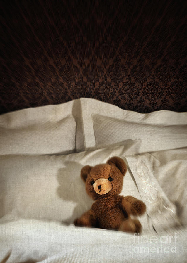Bear Photograph - Small teddy bear on bed by Sandra Cunningham
