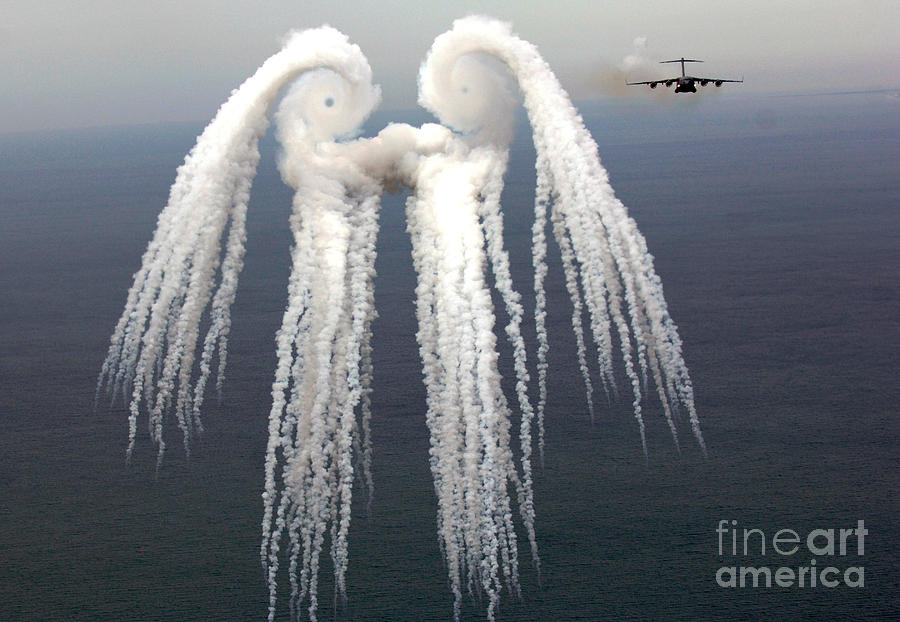 Pattern Photograph - Smoke Angel Created By Wingtip Vortices by Photo Researchers