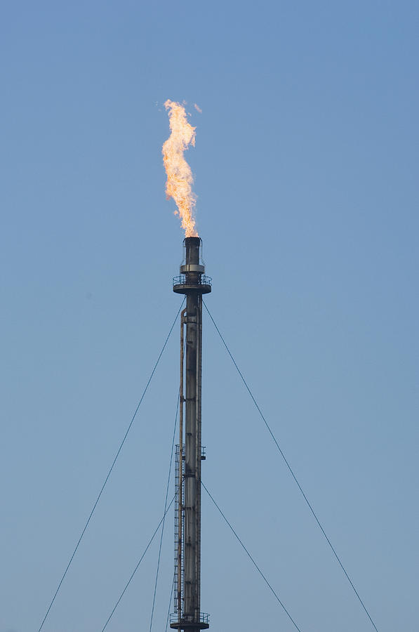 Smoke Stack At Oil Refinery Photograph by Iain Sarjeant | Fine Art America