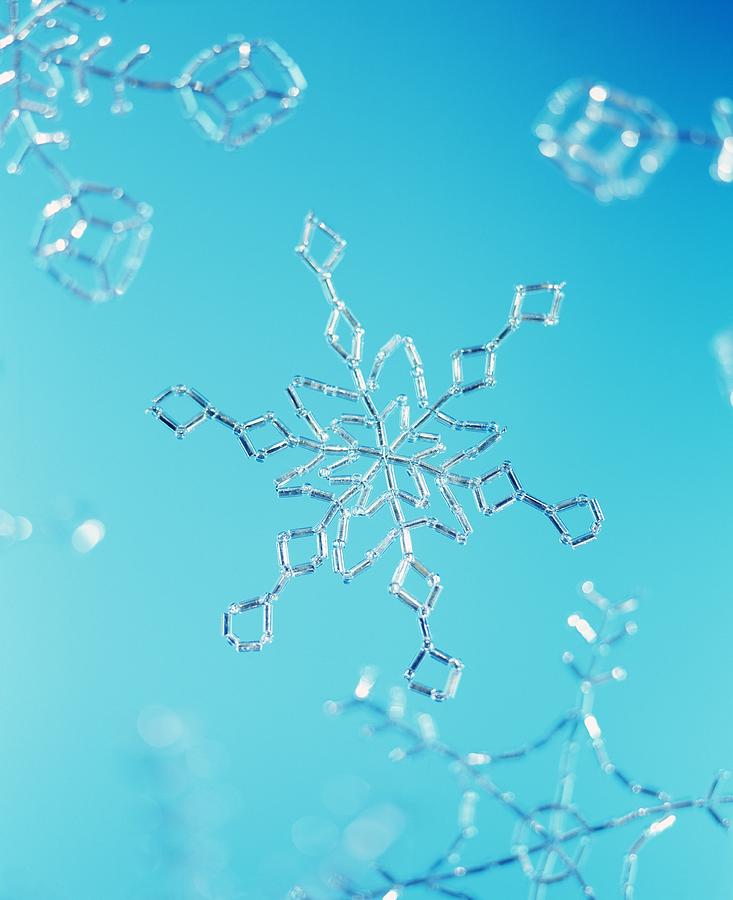 Winter Photograph - Snowflake by Lawrence Lawry