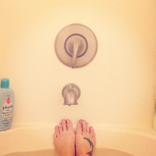 Soaking My Aches... Dang My Feet Are Photograph by Krisd Mauga