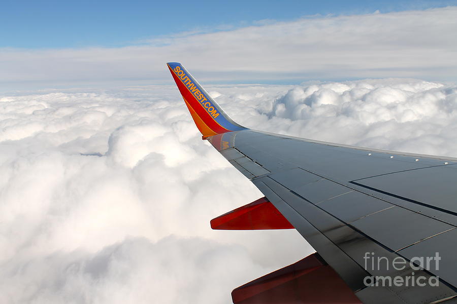 Soaring above the clouds Photograph by Pamela Walrath